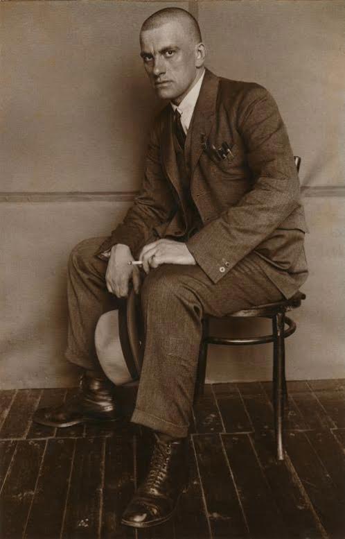 Alexander Rodchenko, Vladimir Mayakovski (full-length, sitting on a chair). 1924 