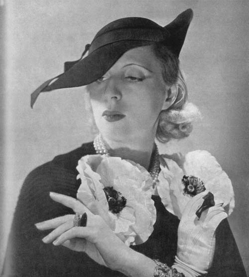 3 tamara de lempicka con cappello rose descat e abito marcel rochas 1935
