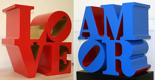 Robert Indiana, a sinistra Love, 1966-1999, scultura, alluminio policromo (red and gold), 91,5x91,5x45,75 cm. AP 3/4. / a destra Amor, 1998, scultura, alluminio policromo (blue and red), 104x96,5x50,8 cm. Ed. 3/6,